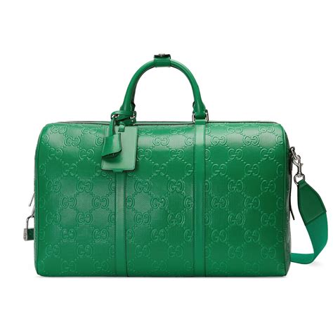 gucci duffle bag first copy|gucci duffle bags men's.